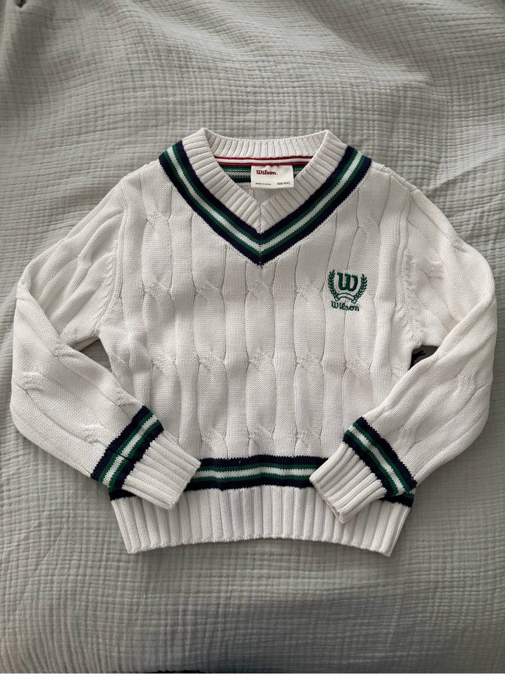 Wilson White Cable-Knit V-Neck Sweater with Green and Navy Stripes